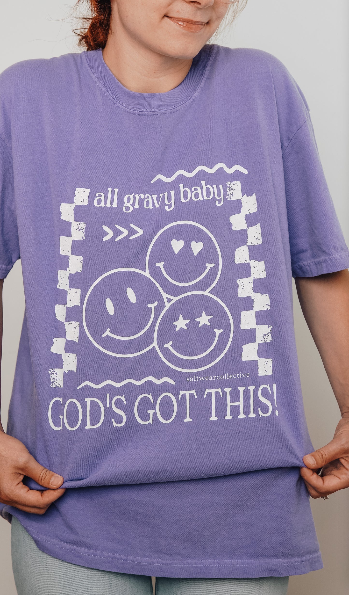 God's Got This retro-inspired tee styled with casual shorts for a laid-back look