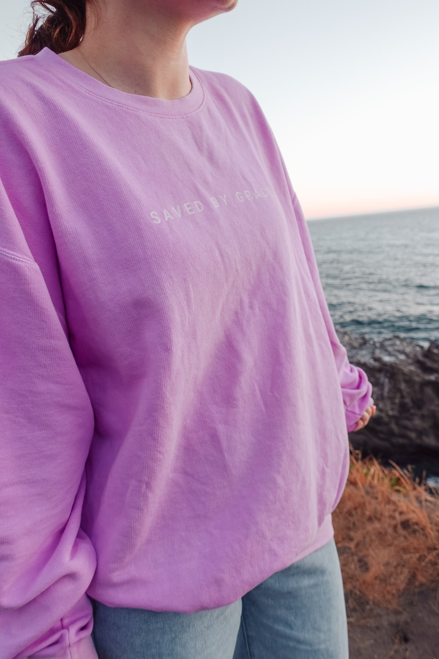 Cozy faith-based crewneck in neon violet