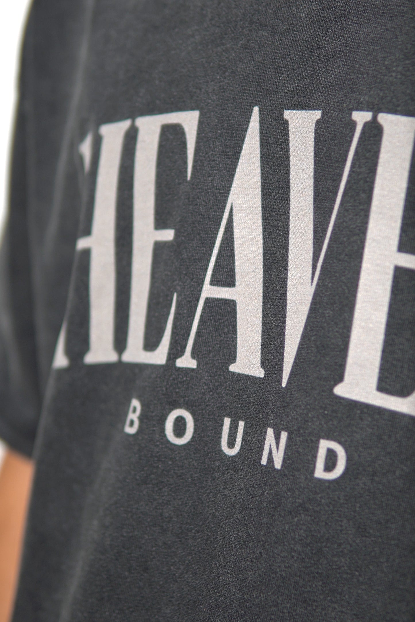 Close-up of Heaven Bound faith graphic on charcoal tee