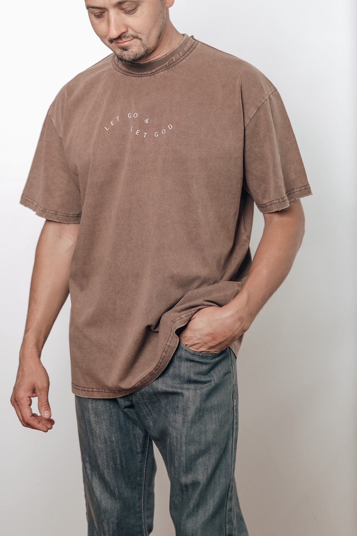 FRONT VIEW  Let Go & Let God brown t-shirt showcasing the sleeve detail