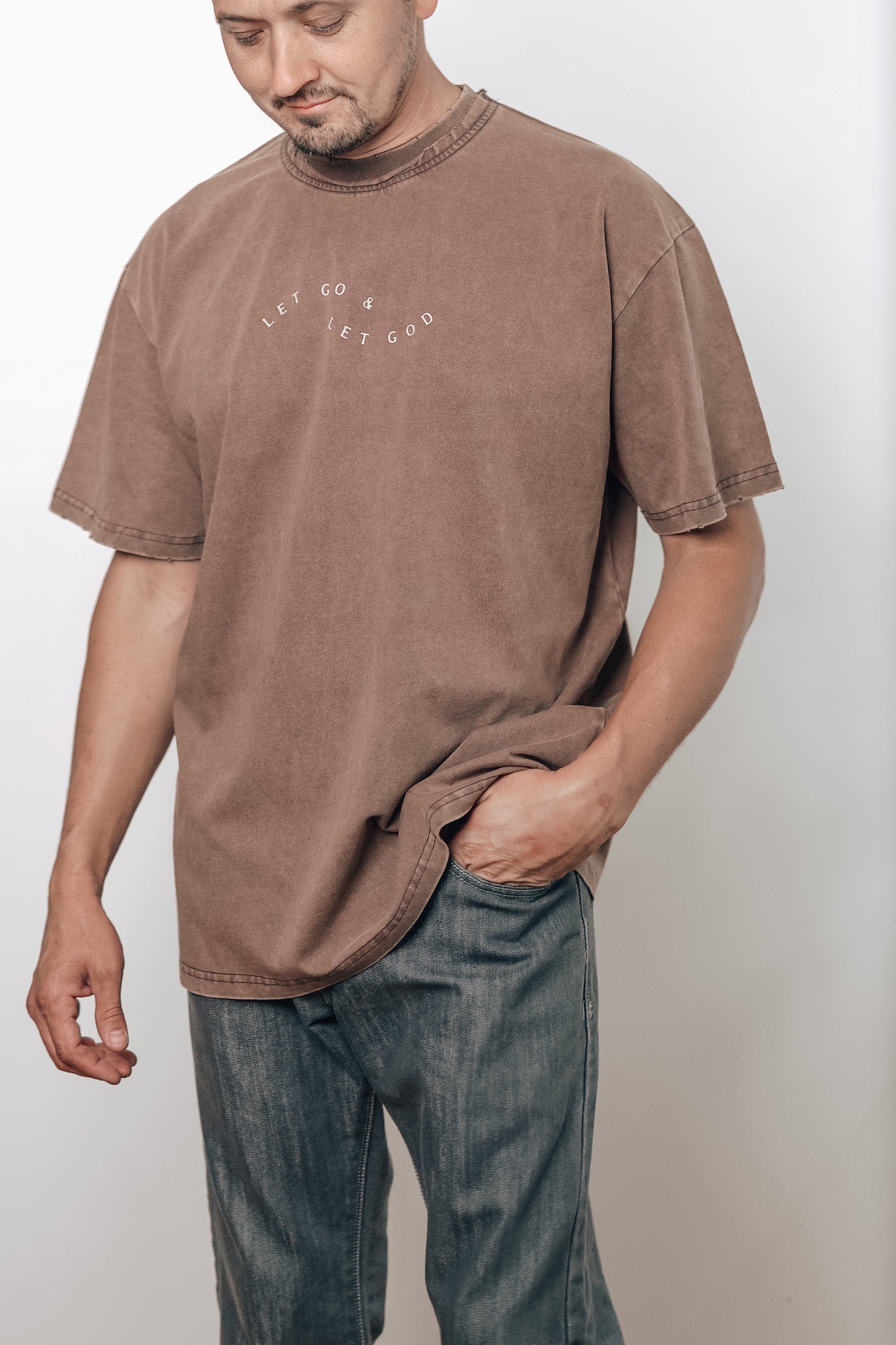 FRONT VIEW  Let Go & Let God brown t-shirt showcasing the sleeve detail