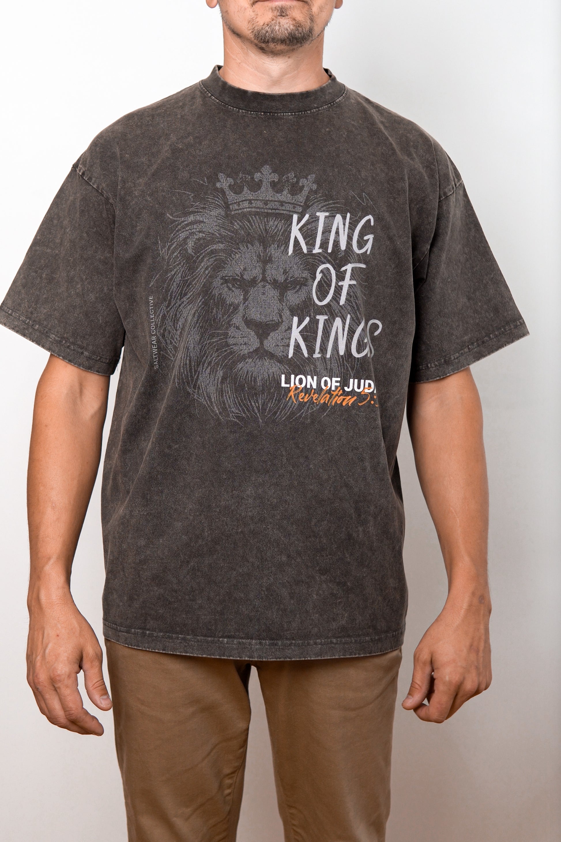 Close-up of Lion of Judah graphic on acid wash tee
