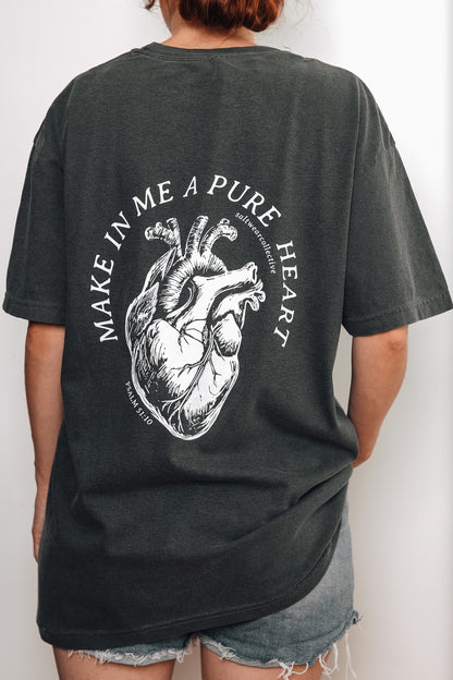 Person wearing Make Me a Pure Heart T-Shirt with anatomical heart graphic and Psalm 51:10