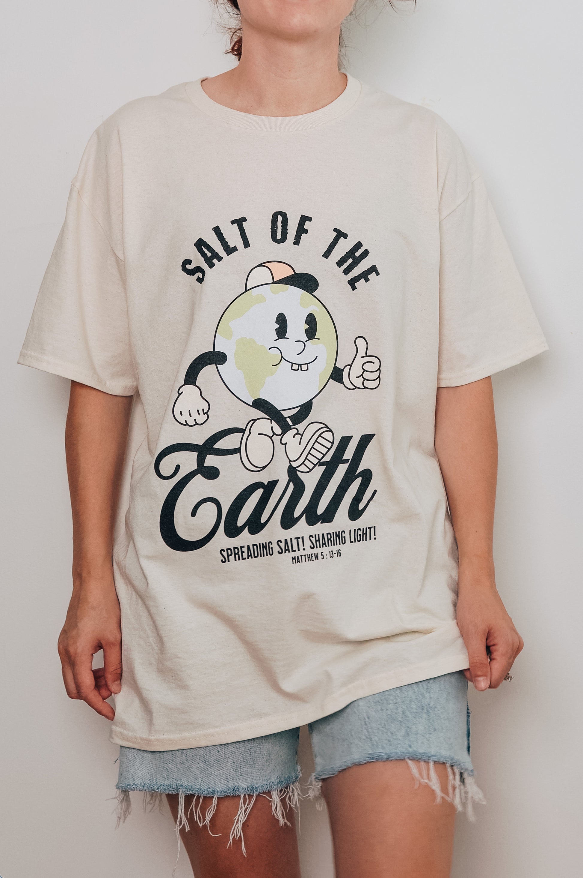 Model wearing Salt of the Earth vintage Christian t-shirt